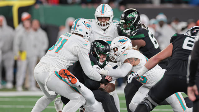 Jets' QB Tim Boyle is sacked by the Dolphins